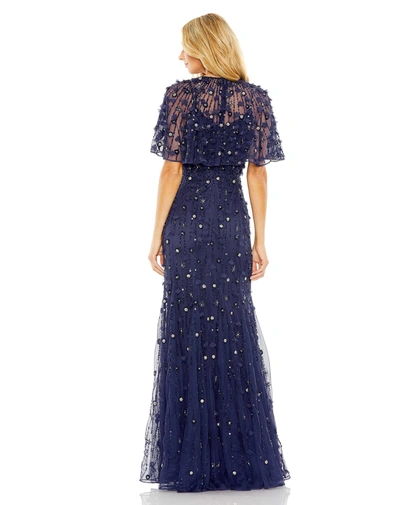 Shop Mac Duggal Embellished Illusion Cape Sleeve Trumpet Gown In Midnight