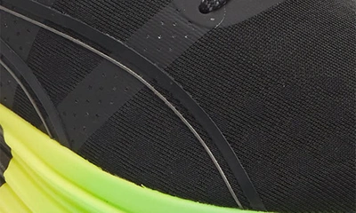 Shop Puma Foreverrun Nitro Futrograde Running Sneaker In  Black-green Gecko