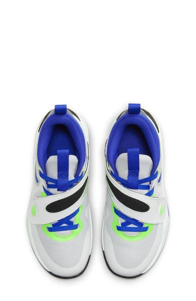 Shop Nike Kids' Team Hustle D 11 Basketball Sneaker In White/ Platinum/ Green/ Blue