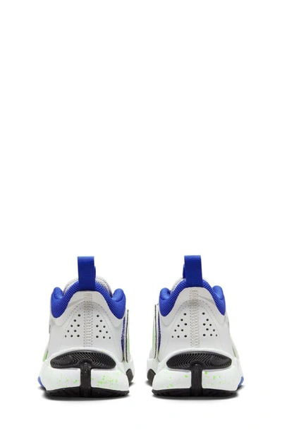 Shop Nike Kids' Team Hustle D 11 Basketball Sneaker In White/ Platinum/ Green/ Blue
