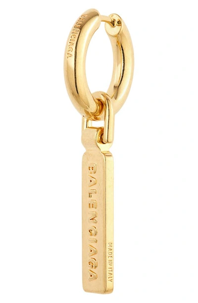 Shop Balenciaga Logo Tag Drop Huggie Hoop Earrings In Gold