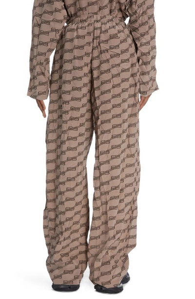 Shop Balenciaga Bb Monogram Silk Crepe Pajama Pants In Beige/ Brown