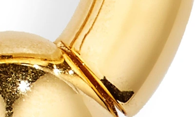 Shop Balenciaga Skate Hoop Earrings In Gold