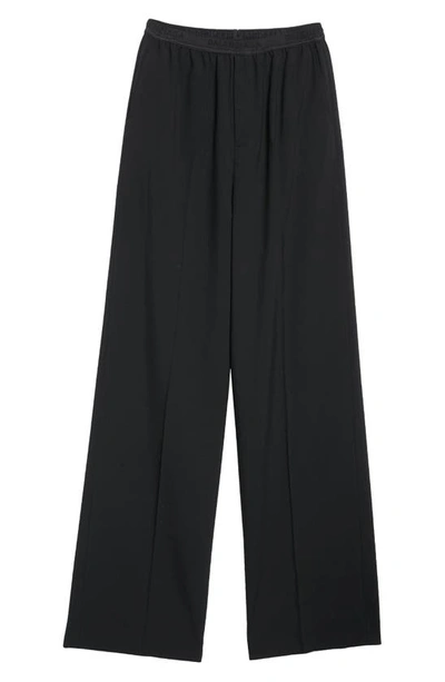 Shop Balenciaga Logo Elastic Waist Wide Leg Wool Pants In Black
