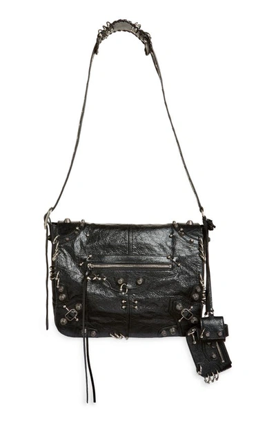 Shop Balenciaga Medium Le Cagole Piercing Messenger Bag In Black