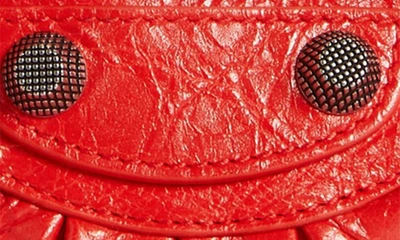 Shop Balenciaga Mini Le Cagole Leather Crossbody In Tomato Red