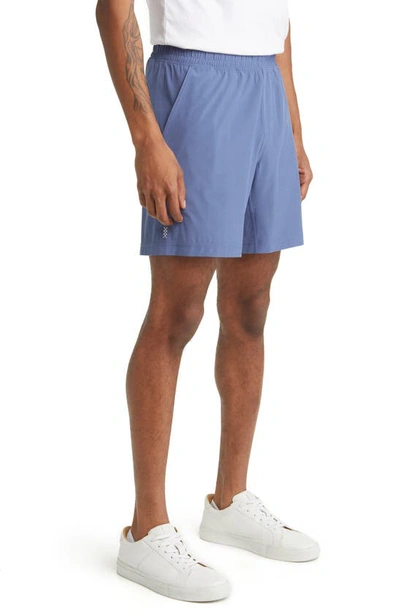 Shop Rhone Mako 7-inch Water Repellent Shorts In Ocean Blue