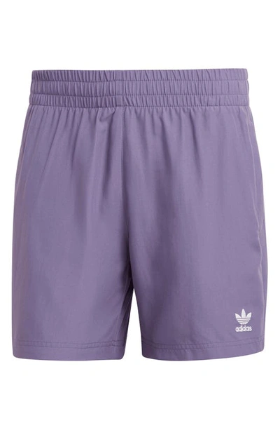 Shop Adidas Originals Ori Solid Swim Trunks In Tech Purple / White