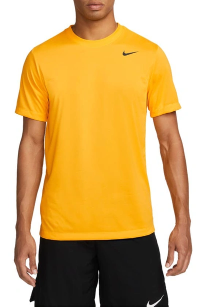 Shop Nike Dri-fit Legend T-shirt In University Gold/ Black