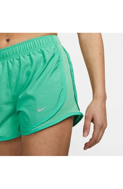 Shop Nike Dri-fit Tempo Running Shorts In Spring Green/ Wlfgry