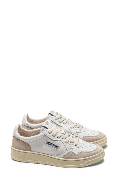 Shop Autry Medalist Low Sneaker In White/ Beige