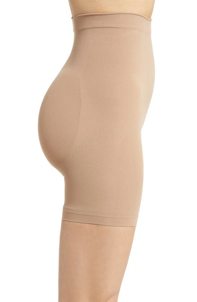 Shop Skims Seamless Sculpt Mid Thigh Shorts In Sienna