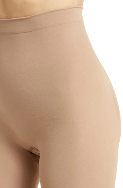 Shop Skims Seamless Sculpt Mid Thigh Shorts In Sienna