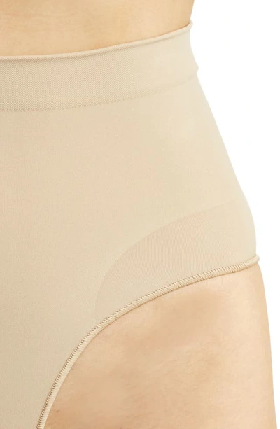 Shop Skims Seamless Sculpt Mid Waist Briefs In Clay