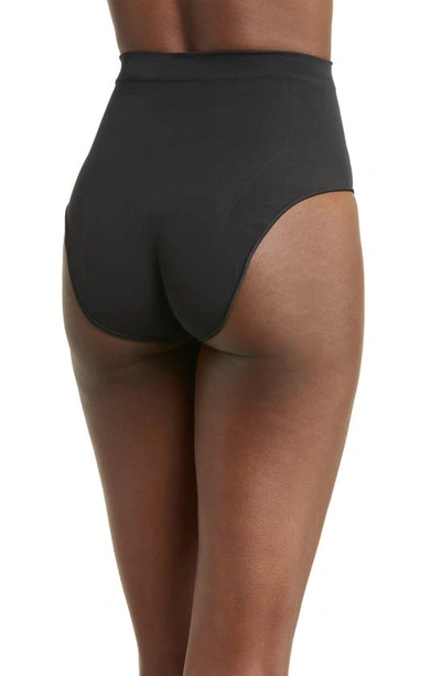 Shop Skims Seamless Sculpt Mid Waist Briefs In Onyx