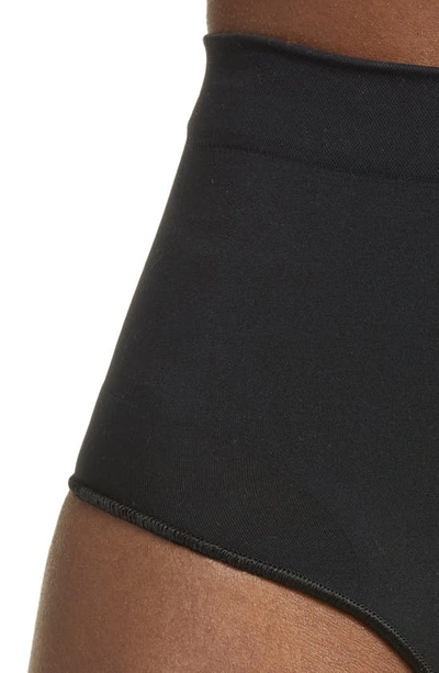 Shop Skims Seamless Sculpt Mid Waist Briefs In Onyx