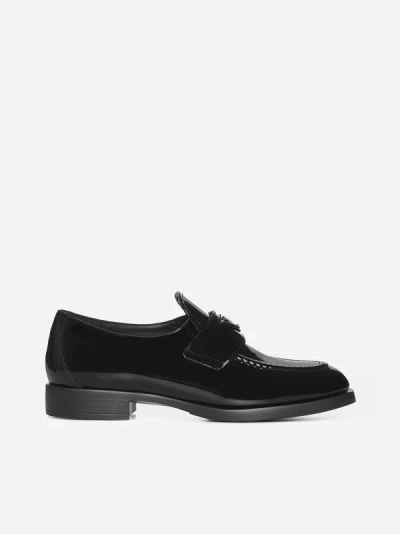 Shop Prada Patent Leather Loafers In Black