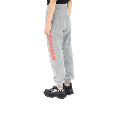 Shop Alexander Mcqueen Graffiti Logo Sport Women's Trousers In Grey