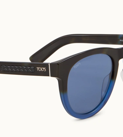 Shop Tod's Sunglasses In Blue