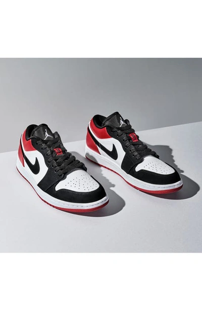 Shop Jordan Nike Air  1 Low Sneaker In White/ Gold/ Aquatone