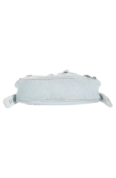 Shop Balenciaga Extra Small Cagole Distressed Denim Shoulder Bag In Pale Blue