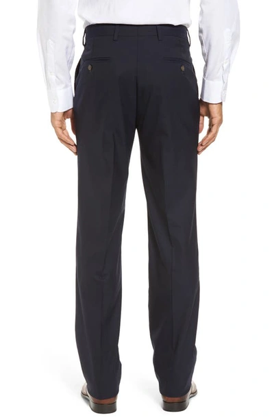 Shop Berle Flat Front Stretch Solid Wool Trousers In Navy