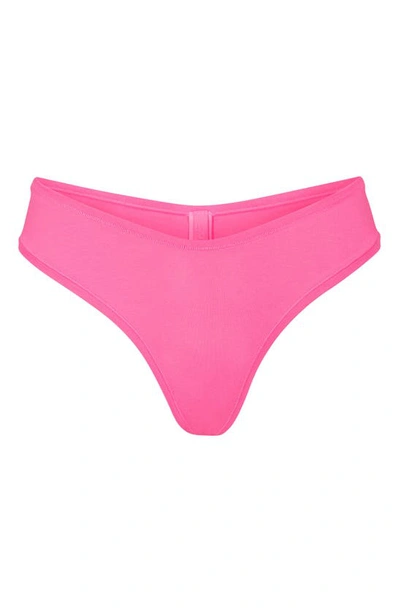 Shop Skims Cotton Jersey Dipped Thong In Pink