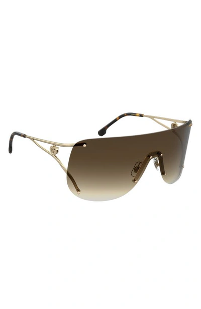 Shop Carrera Eyewear 99mm Shield Sunglasses In Gold Havana/ Brown Gradient