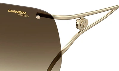 Shop Carrera Eyewear 99mm Shield Sunglasses In Gold Havana/ Brown Gradient