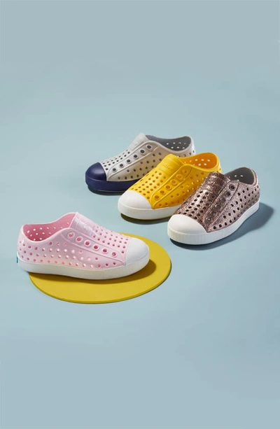 Shop Native Shoes Jefferson Bling Glitter Slip-on Sneaker In Powder Bling/ Shell White
