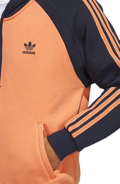 Shop Adidas Originals Sst Fleece Full Zip Hoodie In Hazy Copper/ Legend Ink