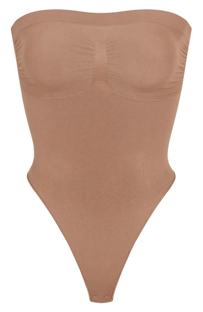 Shop Skims Seamless Sculpt Strapless Bodysuit In Sienna