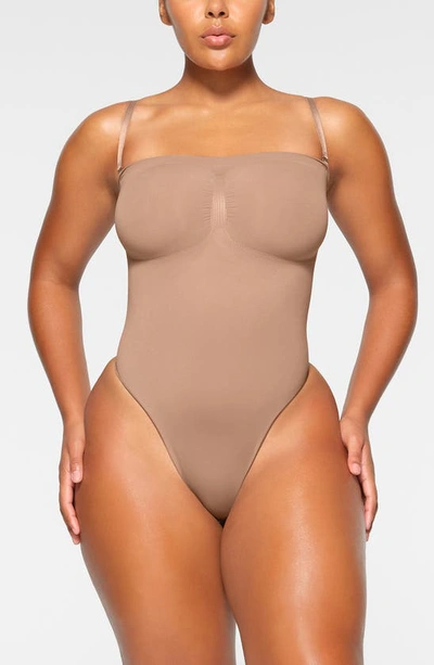 Shop Skims Seamless Sculpt Strapless Bodysuit In Sienna