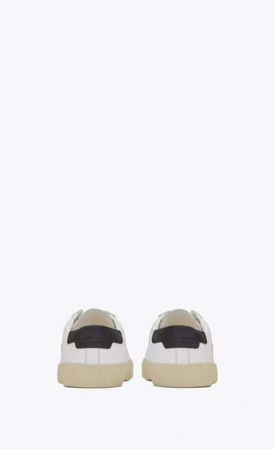 Shop Saint Laurent Men Sl06 Signature Low Top Sneakers In 9061 White/black