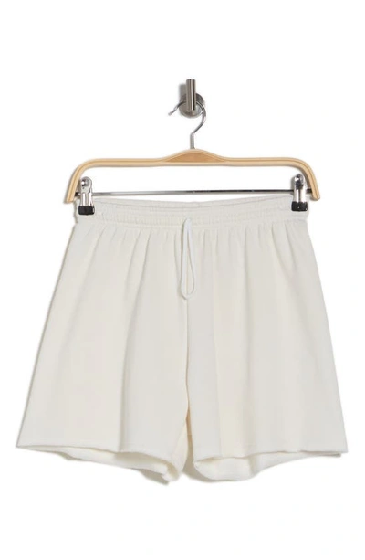 Shop Bella+canvas Cutoff Sweat Shorts In Vintage White