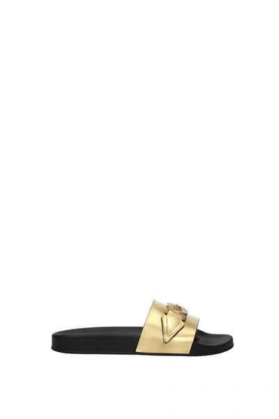 Shop Versace Slippers And Clogs Leather Gold