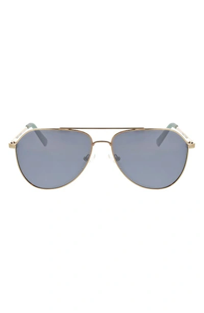 Shop Hurley 60mm Polarized Round Sunglasses In Gold/ Blue