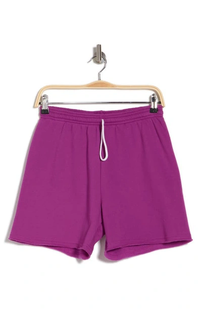 Shop Bella+canvas Cutoff Sweat Shorts In Violetta