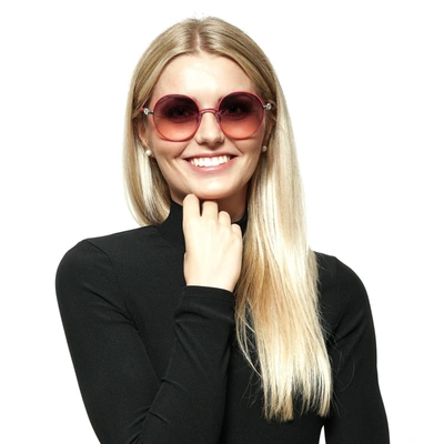 Shop Swarovski Purple Women Women's Sunglasses