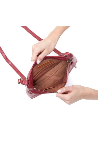Shop Hobo Cambel Leather Crossbody Bag In Cranberry
