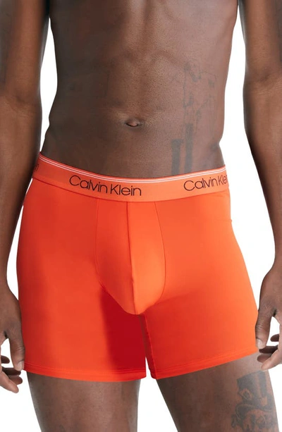 Shop Calvin Klein 3-pack Low Rise Microfiber Stretch Boxer Briefs In Orange/ Asphalt/ Grey