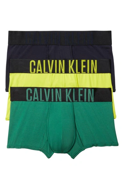 Shop Calvin Klein Assorted 3-pack Intense Power Micro Low Rise Trunks In Navy/ Foliage/ Green