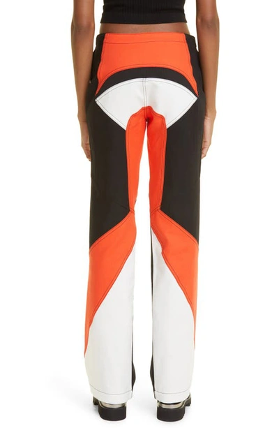 Shop Dion Lee Colorblock Paneled Belted Moto Pants In Fluoro Red White