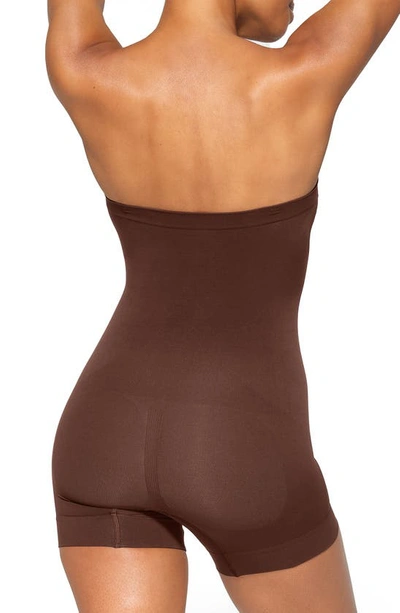 Shop Skims Seamless Sculpt Strapless Shortie Bodysuit In Cocoa