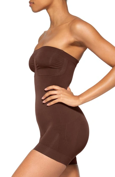 Shop Skims Seamless Sculpt Strapless Shortie Bodysuit In Cocoa