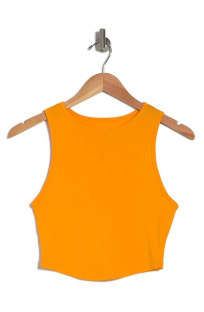 Shop Bella+canvas The Fitted Tank In Solid Marmalade Blend
