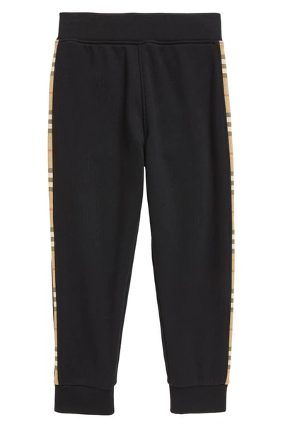 Shop Burberry Kids' Nolen Check Side Track Pants In Black