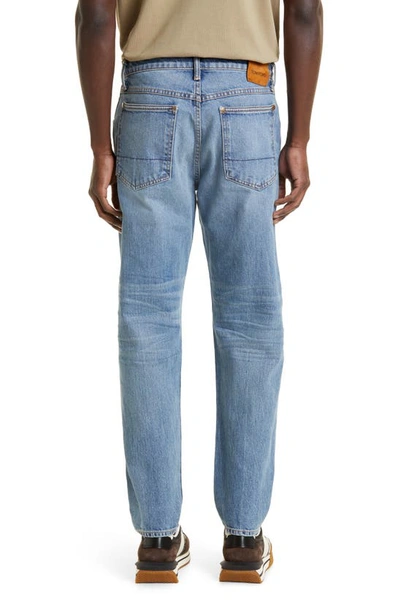 Shop Tom Ford Tapered Fit Stretch Denim Jeans In Washed Blue