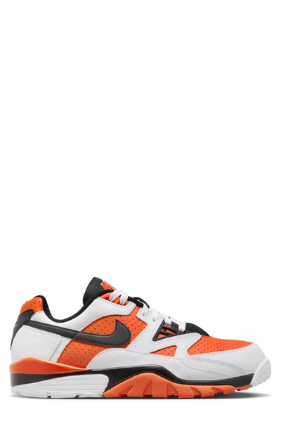 Shop Nike Air Cross Trainer 3 Low Sneaker In White/ Black/ Starfish