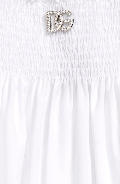Shop Dolce & Gabbana Kids' Smocked Cotton Eyelet Sundress In W0800 Optical White